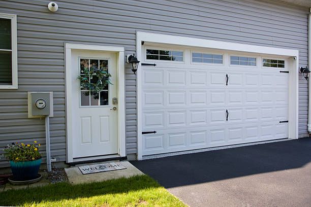 24/7 Emergency Garage Door Panel Replacement experts in Arma, KS